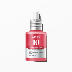 A pink dropper bottle of Anua 10+ Niacinamide 10 + TXA 4 Serum, featuring a silver cap and white dropper, displayed against a white background with the product label on the front.