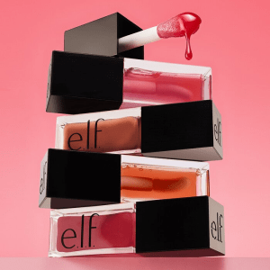 e.l.f. Glow Reviver Lip Oil in sleek packaging, displayed on a minimal backdrop, highlighting its glossy, hydrating formula.