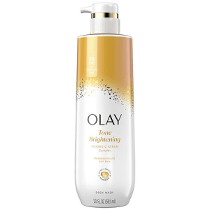 A sleek bottle of Olay Cleansing & Brightening Body Wash placed next to fresh citrus slices, highlighting its Vitamin C and Niacinamide-powered formula for radiant, glowing skin.