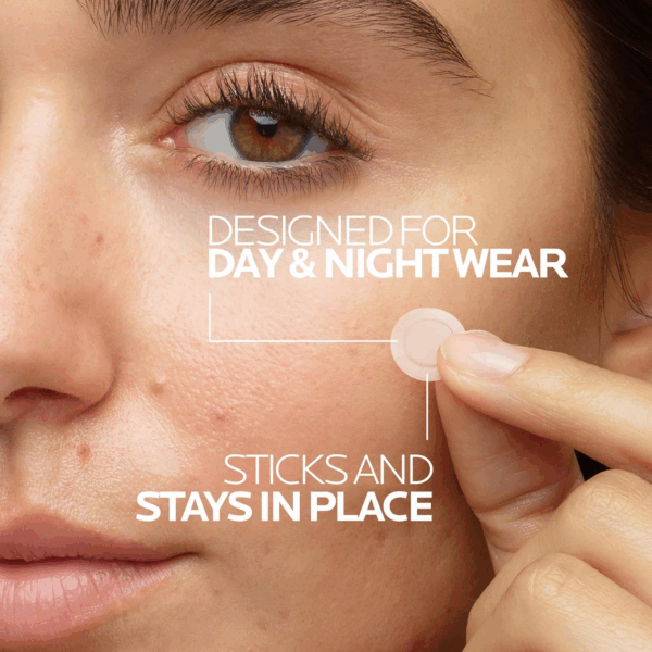 Woman applying a La Roche-Posay blemish patch to her cheek, designed for day and night wear.