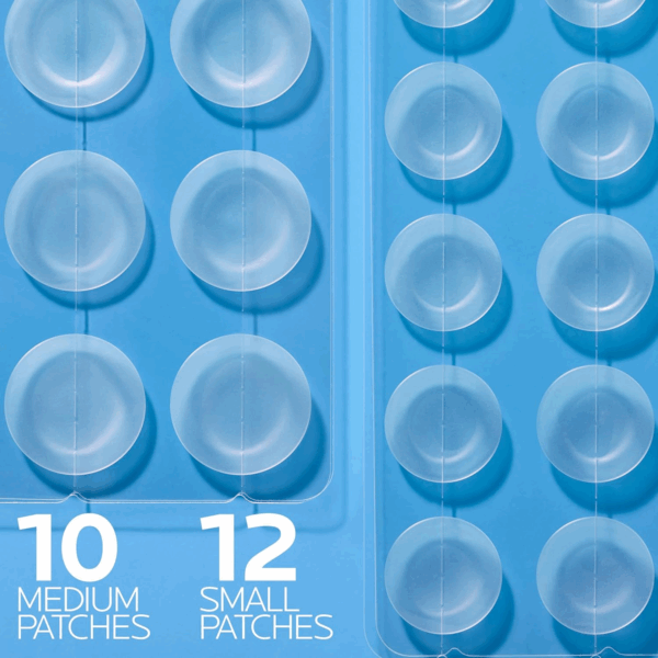 Close-up view of 10 medium and 12 small La Roche-Posay hydrocolloid acne patches on a blue background.