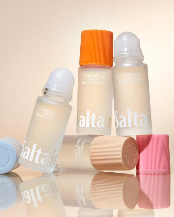 Artistic shot of Saltair Serum Deodorants with caps off – showcasing clean formula and sleek packaging.