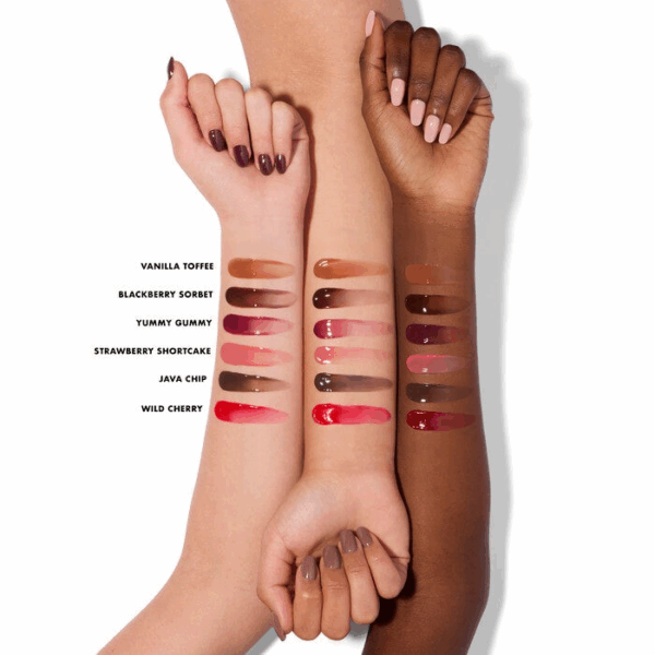 Swatches of e.l.f. Glow Reviver Melting Lip Balm in all shades — Vanilla Toffee, Blackberry Sorbet, Yummy Gummy, Strawberry Shortcake, Java Chip, and Wild Cherry — shown on light, medium, and deep skin tones.