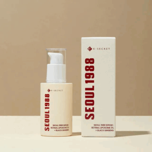 Front facing Seoul 1988 Serum bottle with clear pump beside matching cream box on a neutral background.