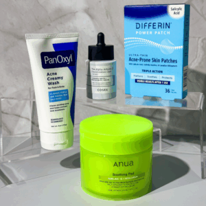 DreamSkinHaven Grab & Go Acne-Prone Kit with PanOxyl, COSRX, Anua, and Differin on acrylic shelf.