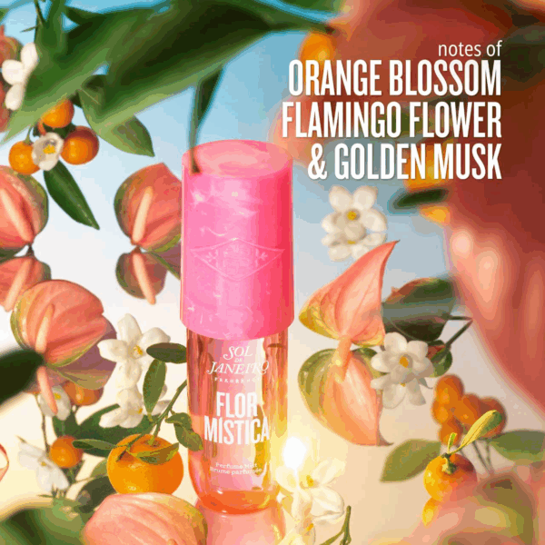 Flor Mistica bottle surrounded by orange blossom flamingo flowers and small citrus fruit to highlight key notes.