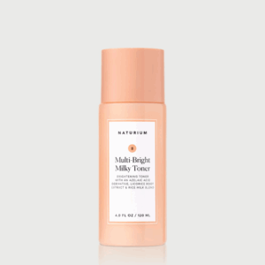Naturium Multi-Bright Milky Toner 120 ml bottle on a clean grey background.