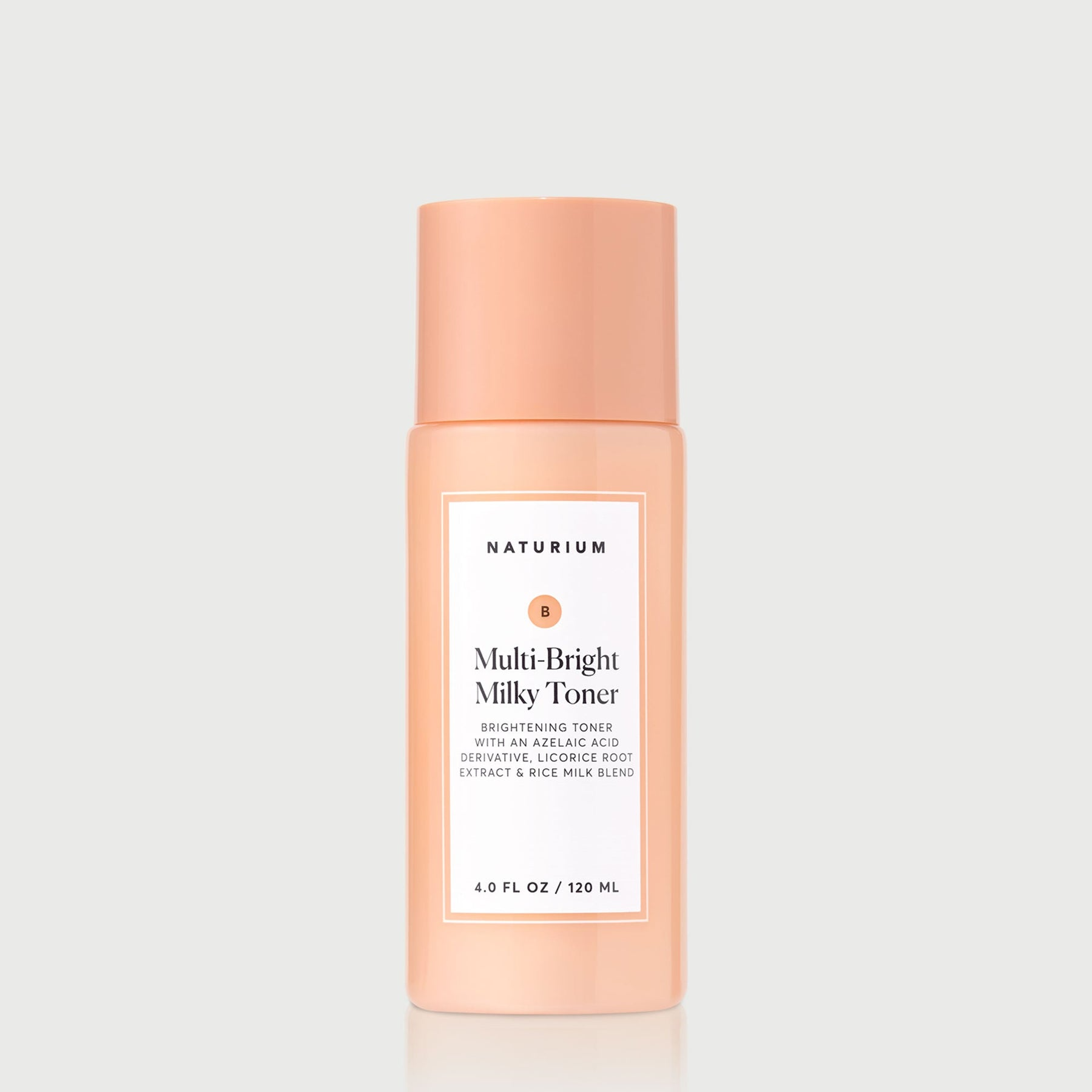 Naturium Multi-Bright Milky Toner 120 ml bottle on a clean grey background.