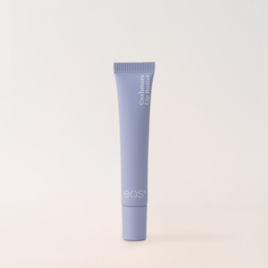 eos Cashmere Lip Butter Vanilla Cashmere lip balm tube on neutral background